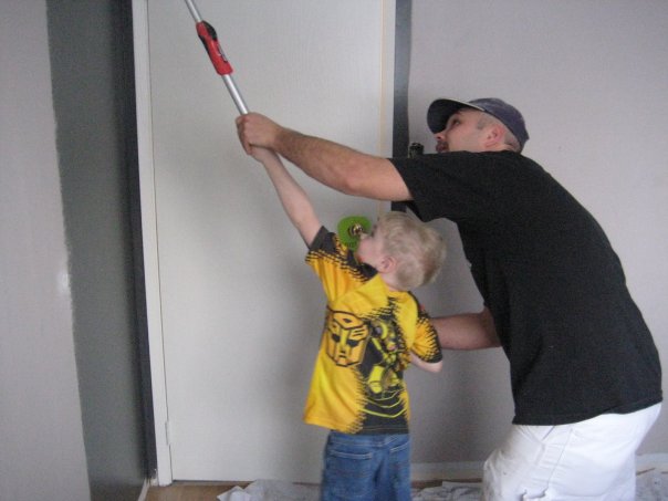 Clint painting with his son