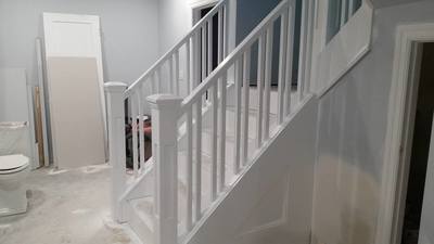 Stairs with railing painted a brilliant white