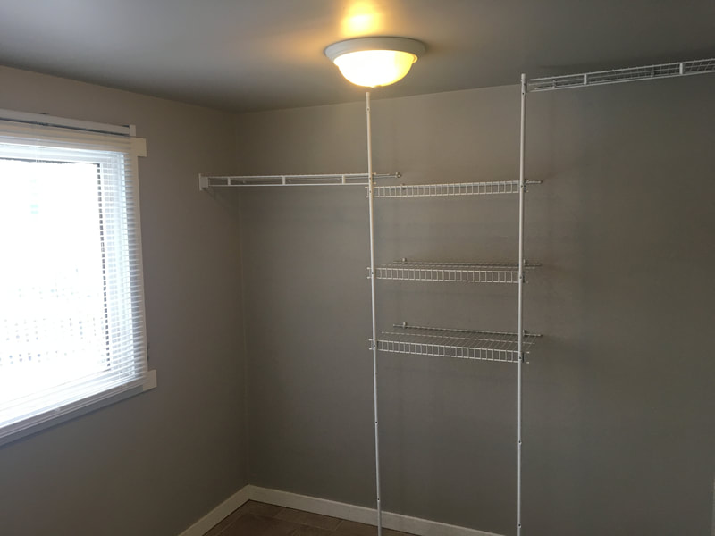 interior storage room professionally painted grey